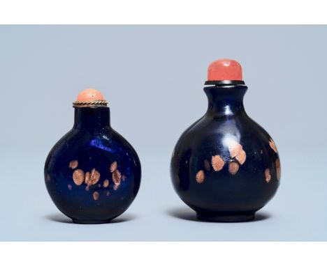 Two Chinese sapphire-blue aventurine-glass snuff bottles, 18/19th C. -- H.: 7,5 - 5,8 cmÊ Ref.: Sotheby's, Snuff Bottles from