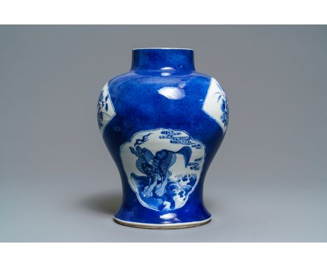 A Chinese blue and white powder blue-ground vase, Kangxi -- H.: 33,5 cm   ---   Condition reports, high resolution images or 