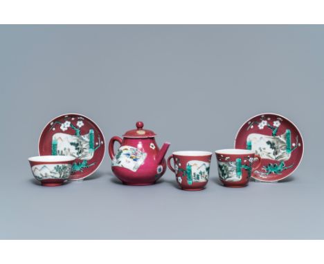 A Chinese famille rose ruby-ground teapot, three cups and two saucers, Yongzheng -- L.: 15,5 cm - H.: 11,5 cm (the teapot) L.