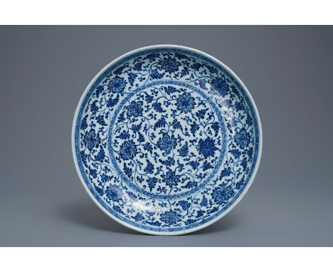 A Chinese Ming-style blue and white 'floral scroll' dish, Qianlong -- Dia.: 36,5 cm   ---   Condition reports, high resolutio