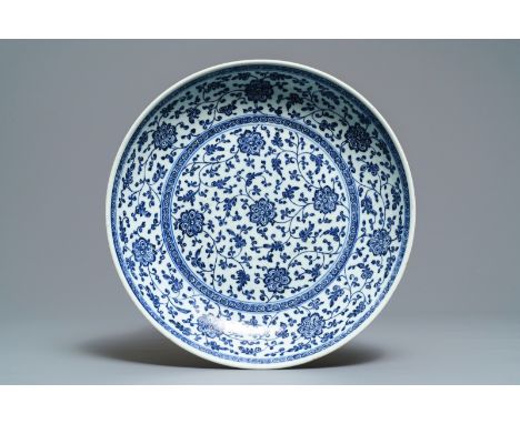 A Chinese Ming-style blue and white 'floral scroll' dish, Qianlong -- Dia.: 36,5 cm - H.: 8,5 cmÊ Condition: (UV-checked) - G