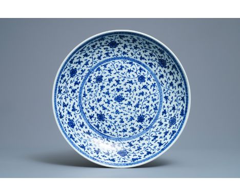 A Chinese Ming-style blue and white 'floral scroll' dish, Qianlong -- Dia.: 37 cm   ---   Condition reports, high resolution 