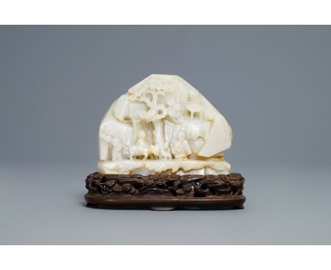 A Chinese celadon jade 'mountain landscape' boulder, 19/20th C. -- H.: 12,5 cm (incl. stand) Dim.: 12 x 9,5 cm (the jade boul