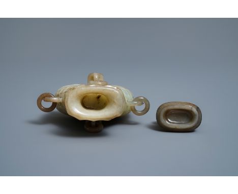 A Chinese jade 'twin fish' vase and a russet jade model of a dog, 19/20th C. -- H.: 20,5 cm (the vase)   ---   Condition repo