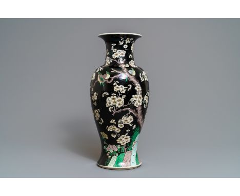 A Chinese famille noire 'magpie and prunus' vase, Kangxi -- H.: 45,5 cmÊ Condition: (UV-checked) - In very good condition.- T