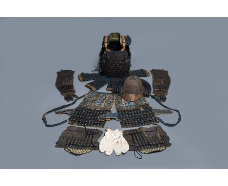 A number of pieces from a Japanese samurai suit of armour, Edo, 18th C. -- H.: 71 cm (the body) H.: 25 cm (the helmet)  --  C