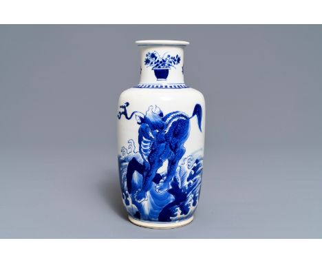 A Chinese blue and white rouleau vase with qilins, Kangxi -- H.: 20,5 cmÊ Condition: (UV-checked) - With restoration along ap