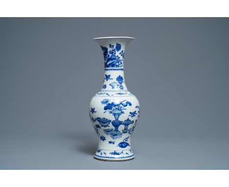 A Chinese blue and white vase with precious objects and floral designs, Kangxi -- H.: 44,5 cm   ---   Condition reports, high