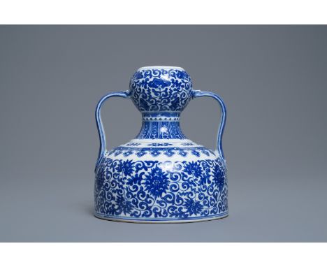 A Chinese blue and white two- Handled 'lotus scroll' jug, Qianlong mark, 19/20th C. -- H.: 18 cm  --  Condition reports, high