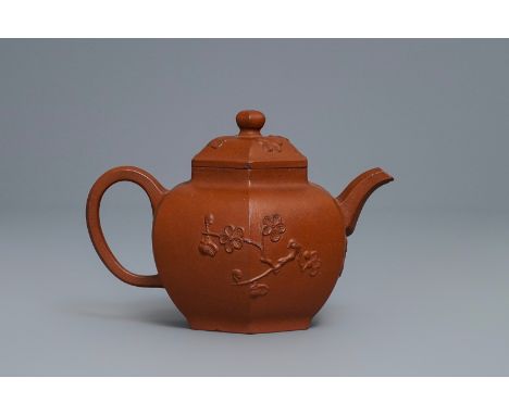 A Chinese Yixing stoneware teapot and cover with applied prunus design, Kangxi -- H.: 9 cm   ---   Condition reports, high re