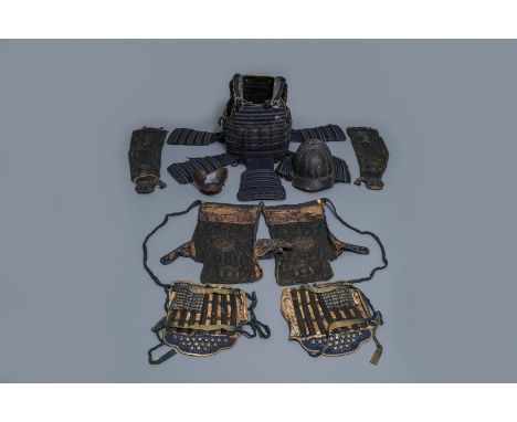 A number of pieces from a Japanese samurai suit of armour, Edo, 18th C. -- H.: 78 cm (the body) H.: 29 cm (the helmet)  --  C