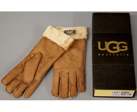 A pair of UGG light brown ladies sheepskin  gloves (medium)