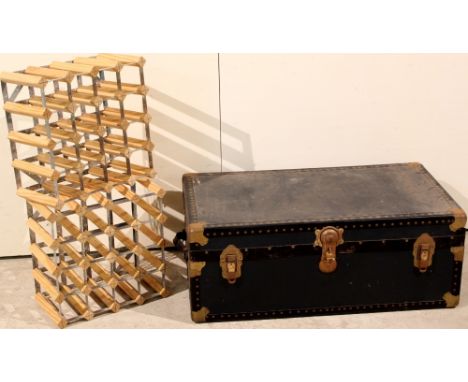 A large travel trunk together with 2 wood & metal wine racks