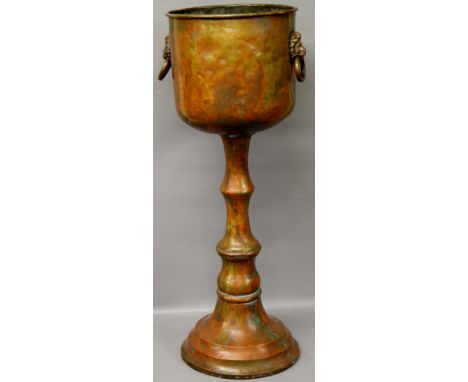 A late 19th/early 20th Century brass repousse planter raised on a pedestal stand - early cog sailing vessel decoration, lion 