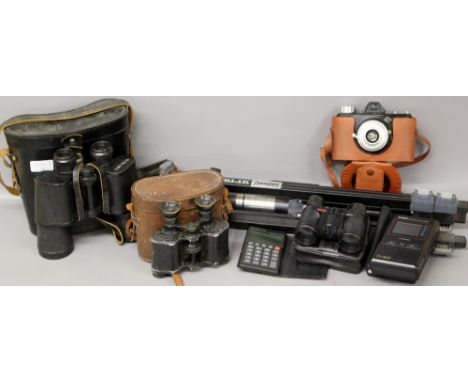 A Casio LCD pocket colour TV,a calculator, 2 pairs of binoculars,a camera and a tripod (6)