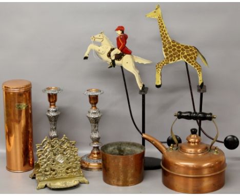 A collection of metal ware including a copper kettle brass letter rack, candlesticks, novelty counter-balanced animals etc.