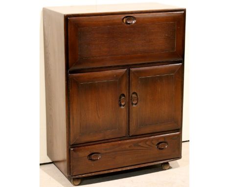 An Ercol bureau/drinks cabinet on castors, with drop-down shelf, drawer and 2 cupboards (83 x 46 x 110 cm h)