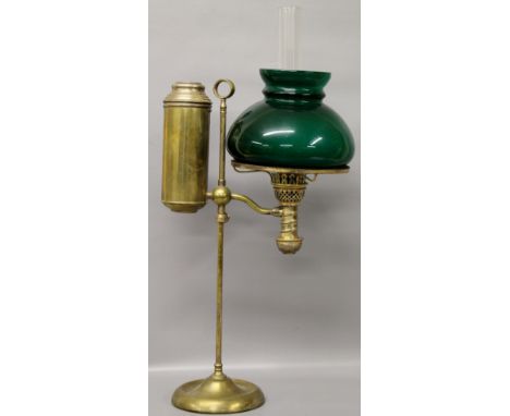 An Edwardian student's oil lamp with green glass shade (cosmos burner)