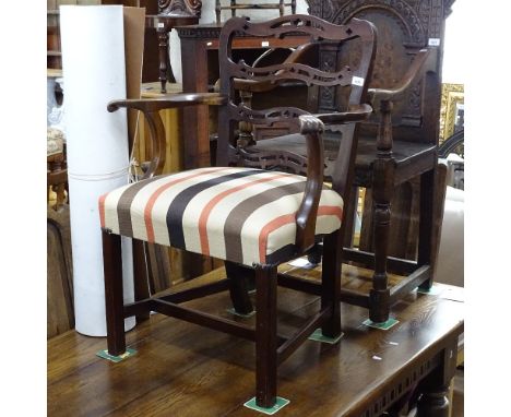 A 19th century Chippendale design pierced ladder-back armchair 