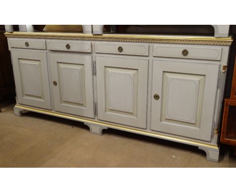 A large grey painted and gilded sideboard, with 4 frieze drawers and fielded panelled cupboards under, on bracket feet, L202c