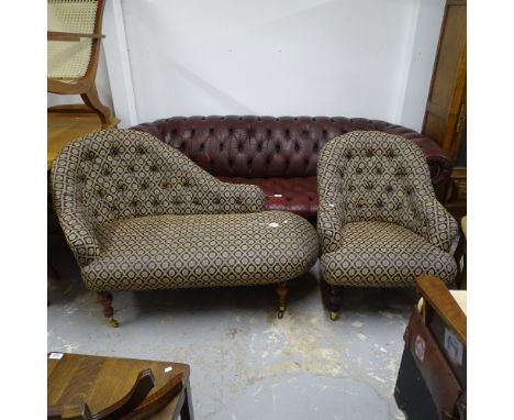 A button-back upholstered armchair on turned legs, and a matching chaise of small size, part of the Stuart Jones Collection 