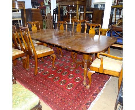 A good quality reproduction oak plank-top refectory dining table by Bylaw of Norwich, on chamfered legs with H-shaped stretch