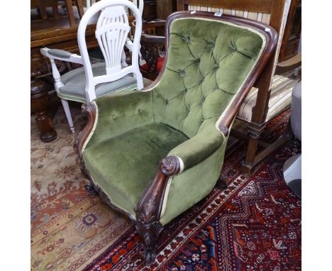 A Victorian mahogany-framed button-back upholstered armchair 