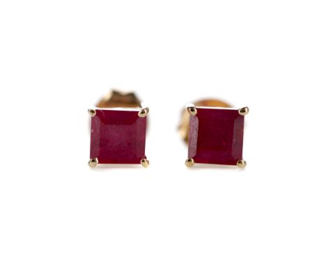 PAIR OF RUBY STUD EARRINGS, set with step cut rubies, marked 9K, 1.2g