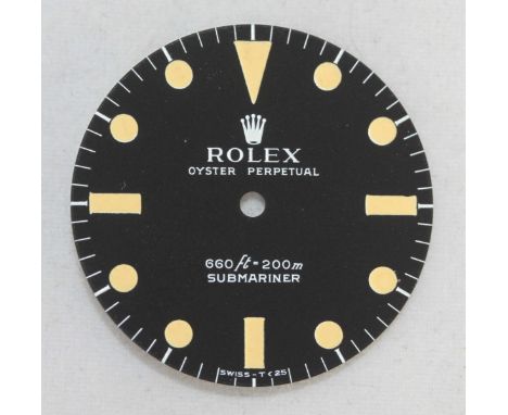 An original Rolex Submariner '5513' model replacement matte black dial. NOS in original Rolex branded packet. 25.7mm.