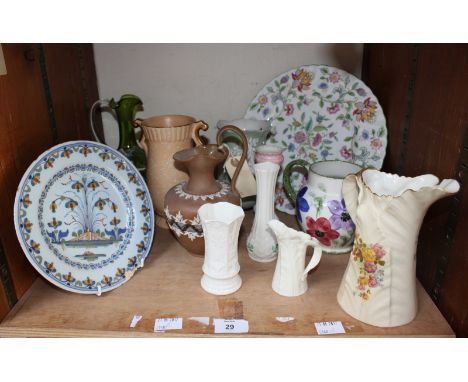 SECTION 29. An assortment of mixed ceramics including an 18th Century Delft plate, a Royal Worcester jug and some Belleek amo