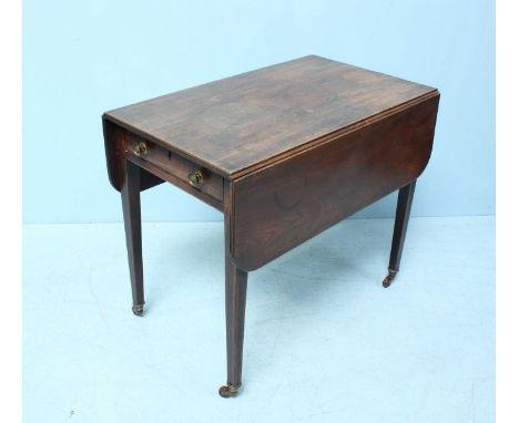 A late 19th century mahogany drop-leaf Pembroke table of rectangular form, with triple-reed edge, single frieze drawers with 