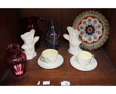SECTION 42. A quantity of cranberry glass and lustre glass items, together with a small collection of Belleek porcelain items
