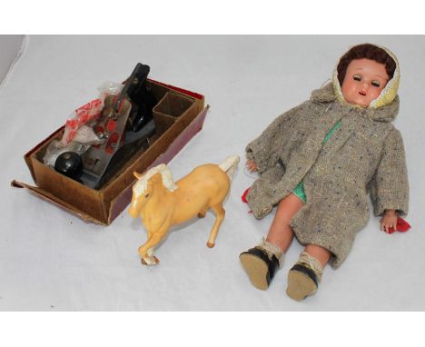 A Beswick ceramic horse, together with a child's model doll and a carpenter's smoothing plane.