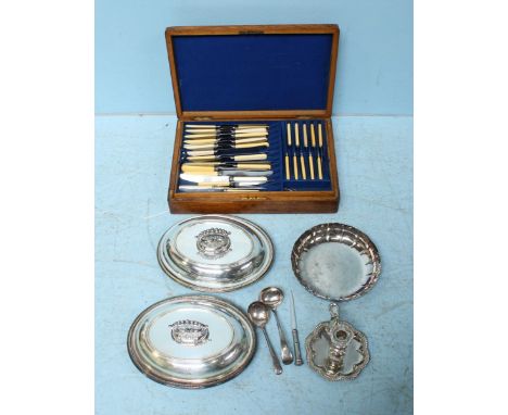 A pair of silver-plated oval serving tureens and covers with detachable handles, each engraved with the motto and family cres