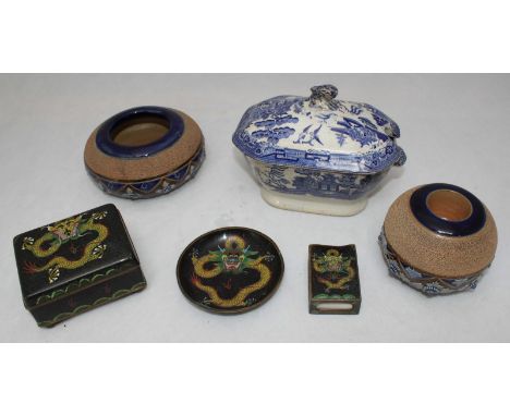 Two Royal Doulton stoneware match strikers decorated with blue and brown designs, tallest 7cm high, widest 13.5cm, together w