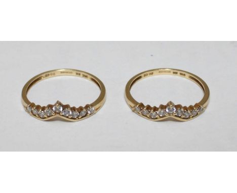 A pair of 14ct gold wishbone rings, each set with ten Cubic Zirconias, ring size Q/R, total weight approximately 3.7g