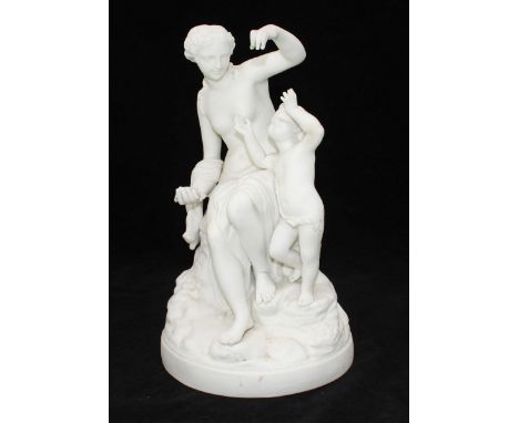 A parian ware ceramic figure group depicting a partially nude classical  lady playing with a child, possibly Venus and Cupid,