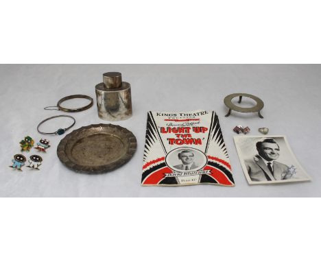 A small quantity of silver items, including a tea canister, ashtray, two bangles and a ring, together with silver plated stan