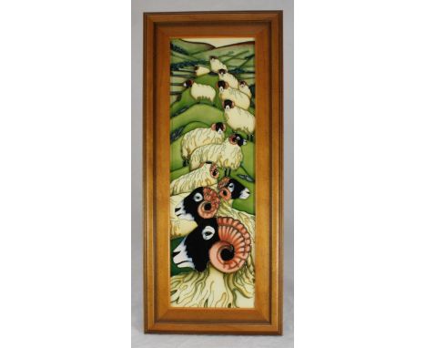 A Moorcroft ceramic plaque "Swaledale Summer" depicting numerous blackface rams grazing among a landscape, designed and signe