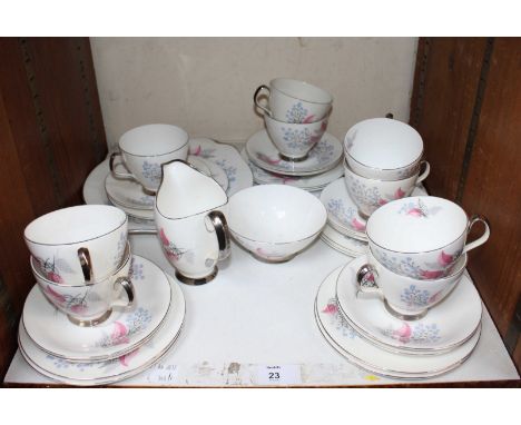 SECTION 23. A Thirty-piece Royal Albert 'Fancy Free' pattern ceramic tea set, comprising of cups, saucers and plates etc.