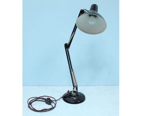 An angle-poise 'style' articulated desk lamp by  'Thousand & One Lamps Ltd,' black lacquered with three-core cable