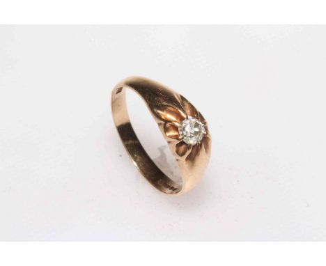 Gents single stone diamond ring set in 9 carat yellow gold, size T.