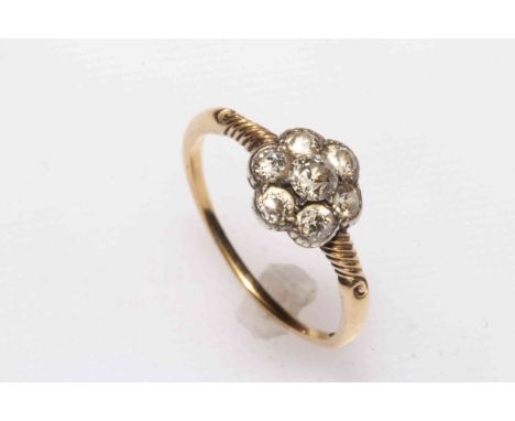 18 carat yellow gold seven stone petal design diamond ring, size S½.