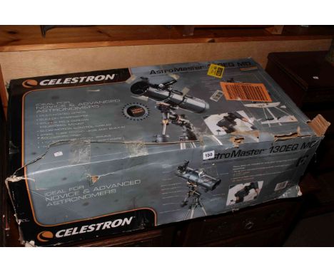 Celestron Astromaster 130EQ telescope with tripod.