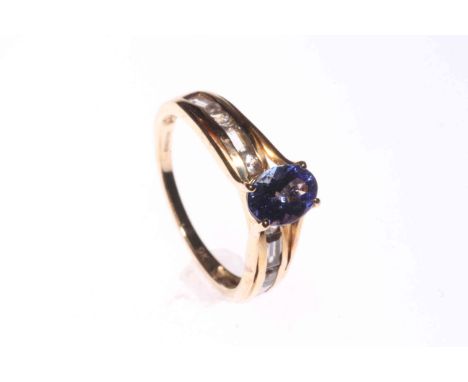 9 carat gold one carat Tanzanite and Diamond ring, size P½.