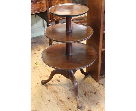 Georgian mahogany graduated three tier circular dumb waiter on tripod base, 101cm.