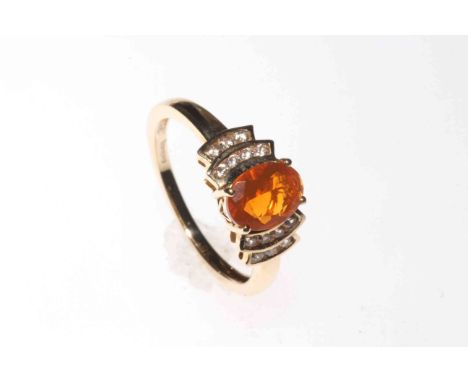 9 carat gold and 1.75 carat fire Opal and Diamond ring, size P½.
