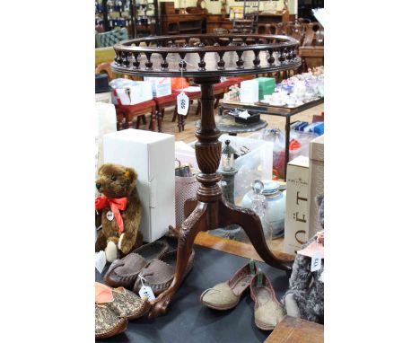 Circular mahogany galleried topped occasional table on pedestal tripod base, 64cm by 47cm diameter.