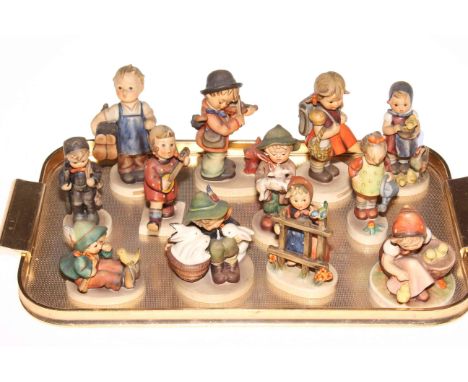 Collection of twelve Hummel figures including Puppy Love, Feeding Time, Signs of Spring and Playmates.