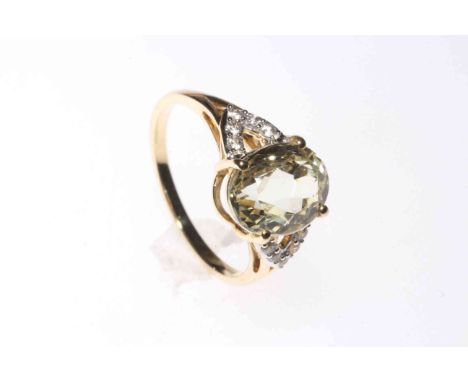 9 carat yellow gold 4.7 carat Canary Kunzite and white Zircon ring, size P½ with certificate.